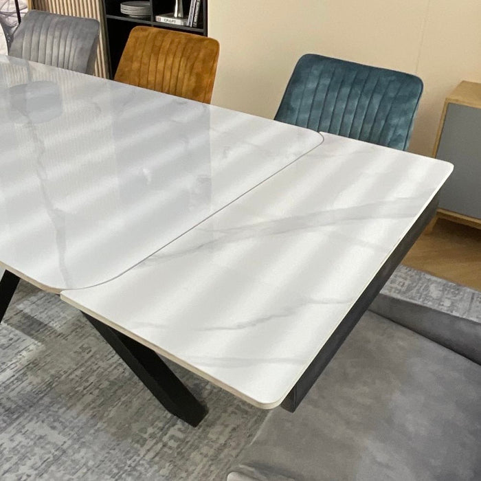 Obsidian Ceramic Extending table with 360 spin chairs dining set