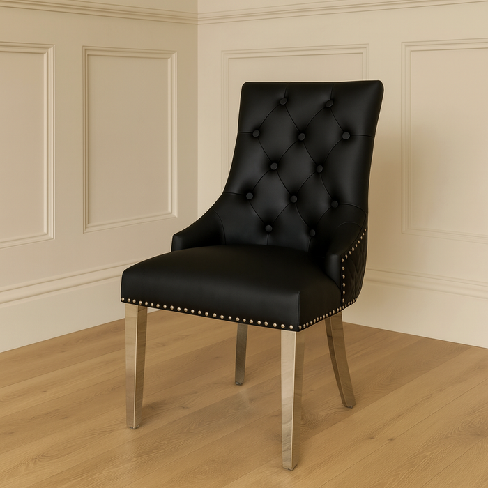 Pair of Bentley black leather knocker dining chairs lions head