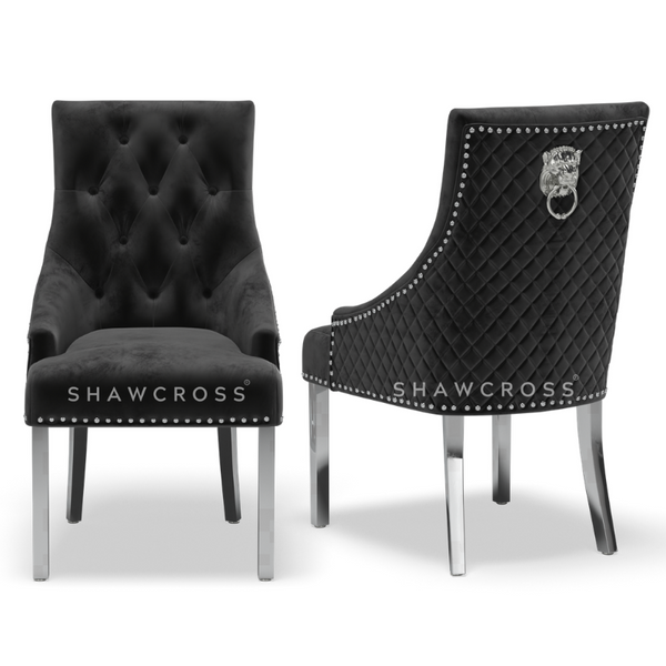 Pair of black Bentley quilted back lion knocker chairs